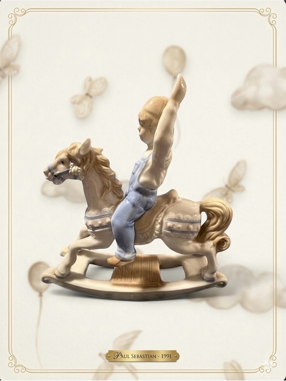 Paul Sebastian porcelain figurine of a boy on a rocking horse, dated 1991